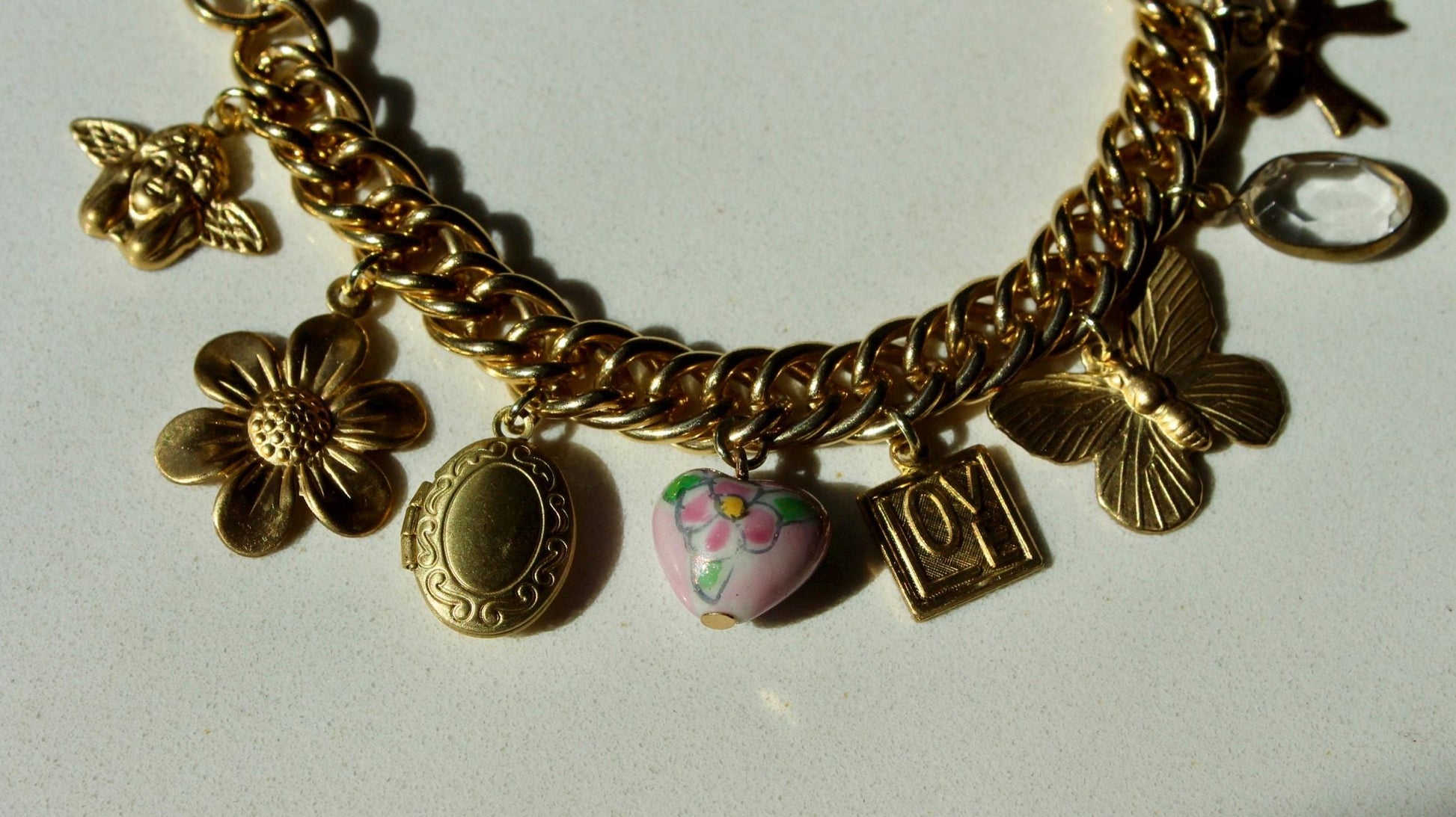 Vintage Loaded Charm Bracelet - Vintage Feminine Locket Charm Bracelet - Vintage Raw Brass Clover, Floral, Butterfly, Heart Charm Bracelet