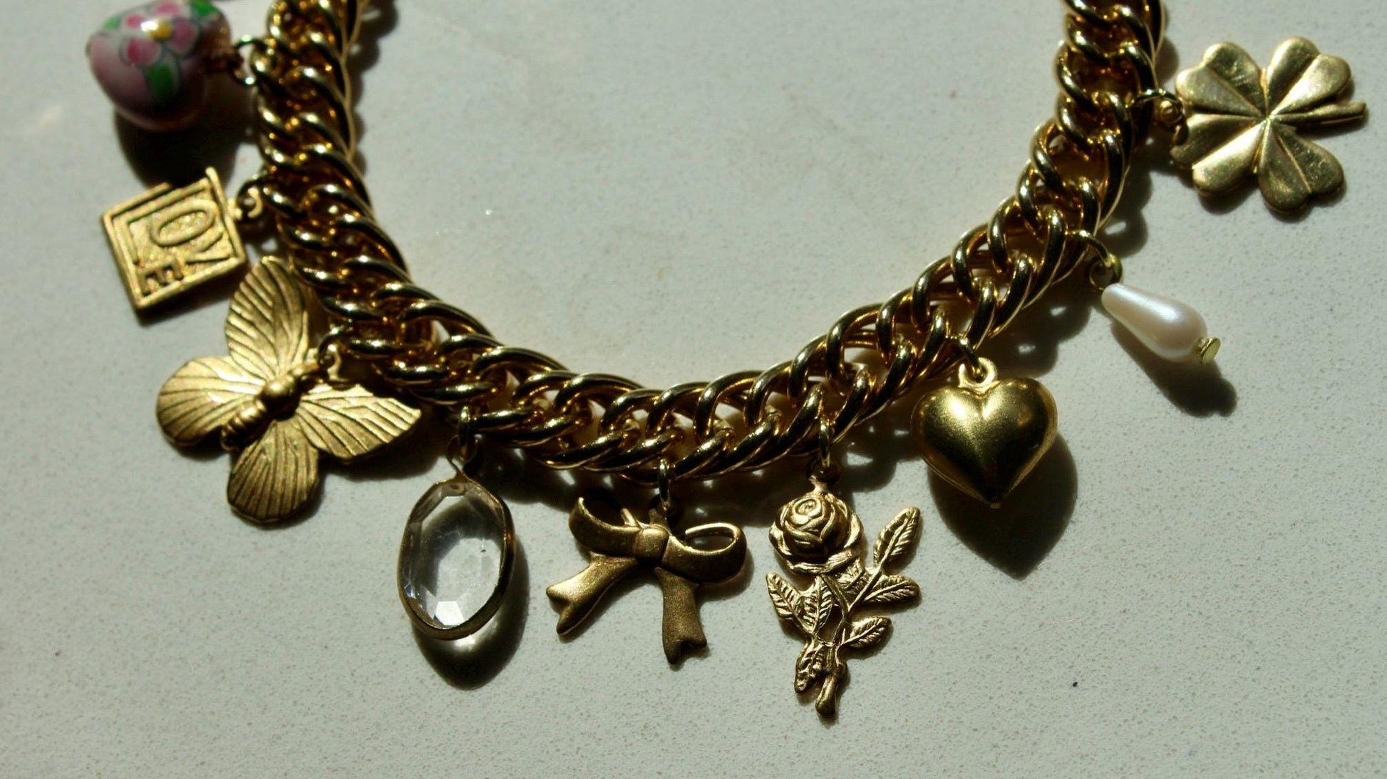 Vintage Loaded Charm Bracelet - Vintage Feminine Locket Charm Bracelet - Vintage Raw Brass Clover, Floral, Butterfly, Heart Charm Bracelet