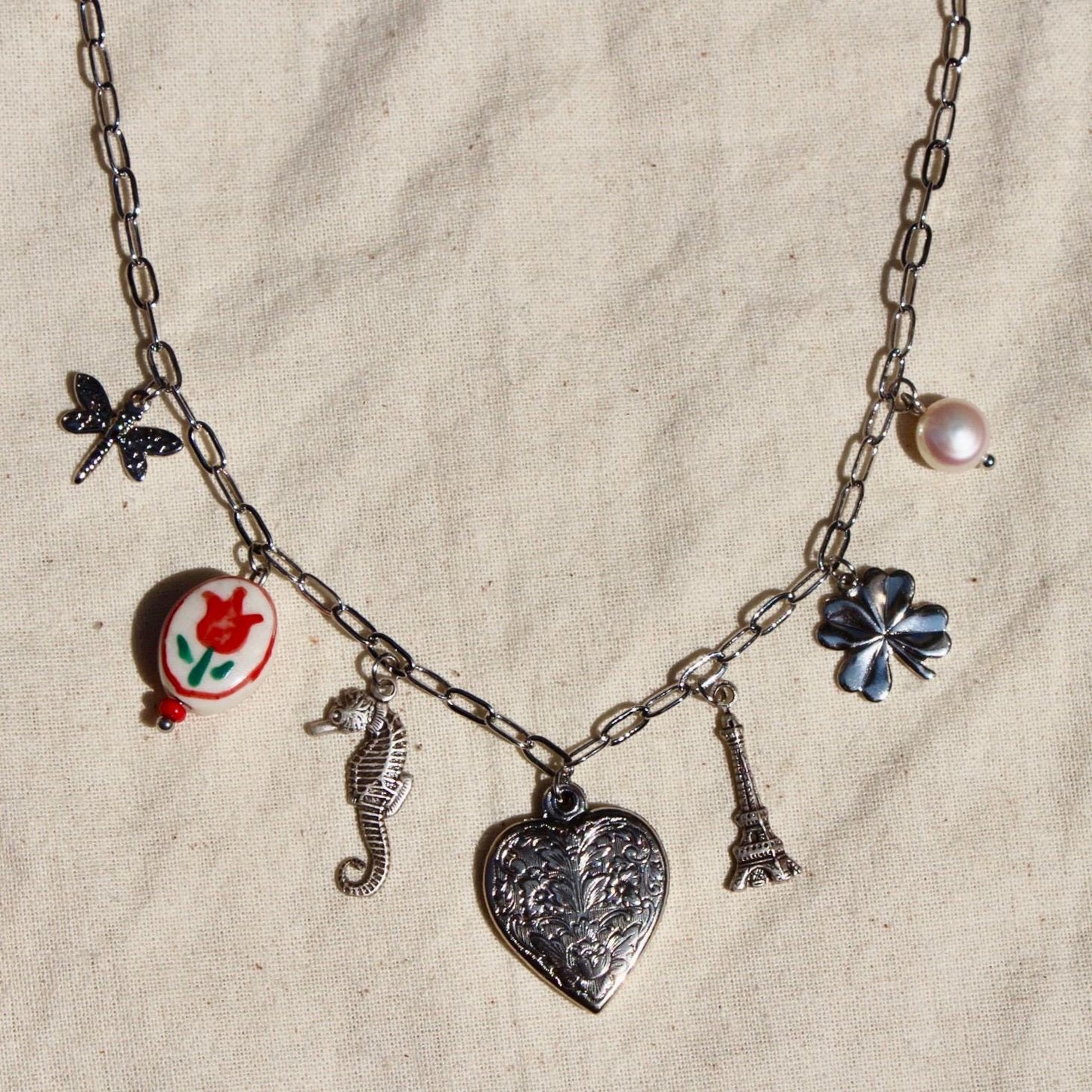 Vintage Silver Charm Necklace - Statement Necklace with Vintage and Modern Silver Plated Charms - Clover, Heart, Porcelain, and Pearl Charms