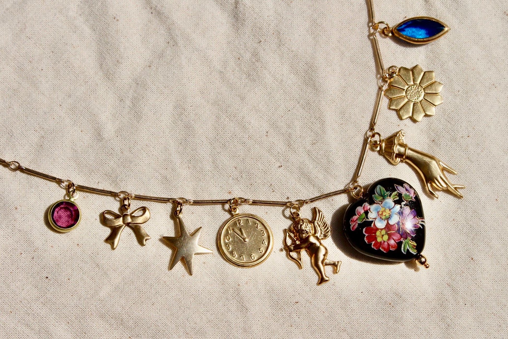 Vintage Floral Heart Charm Necklace - Necklace with Vintage Japanese Bead, Glass, and Brass Charms - Bow, Floral, Hand, Locket and Hearts